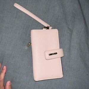 NWOT light pink wristlet wallet and phone holder Tosh 
New